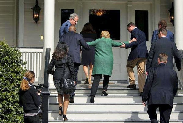 H Clinton on stairs.jpg