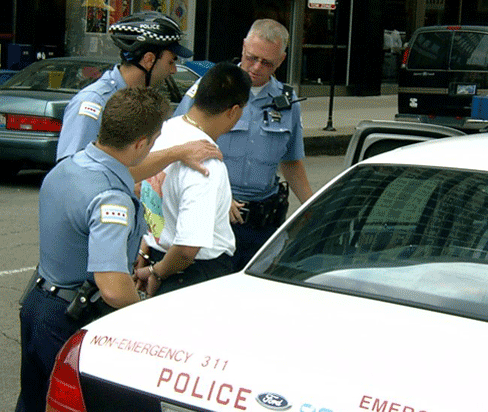 Man_being_arrested.gif