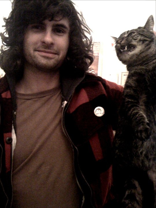 man w angry cat.jpg