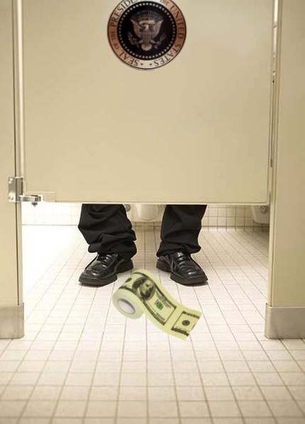 low_section_of_businessman_in_bathroom_stall_BLD004339.jpg
