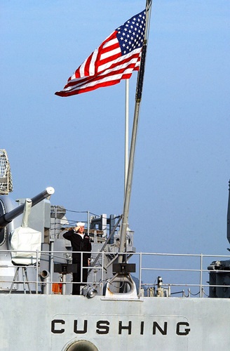 US_Navy_021025-N-6811L-009_Morning_colors_aboard_USS_Cushing.jpg