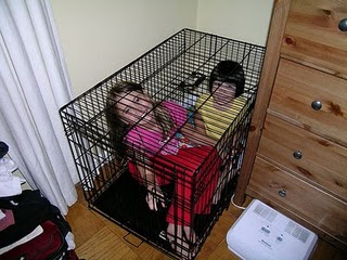 Caged kids.jpg