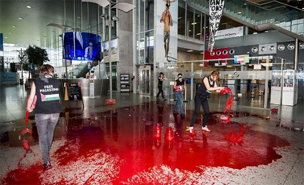 Belgian_WOmen_Airport_Blood.jpg