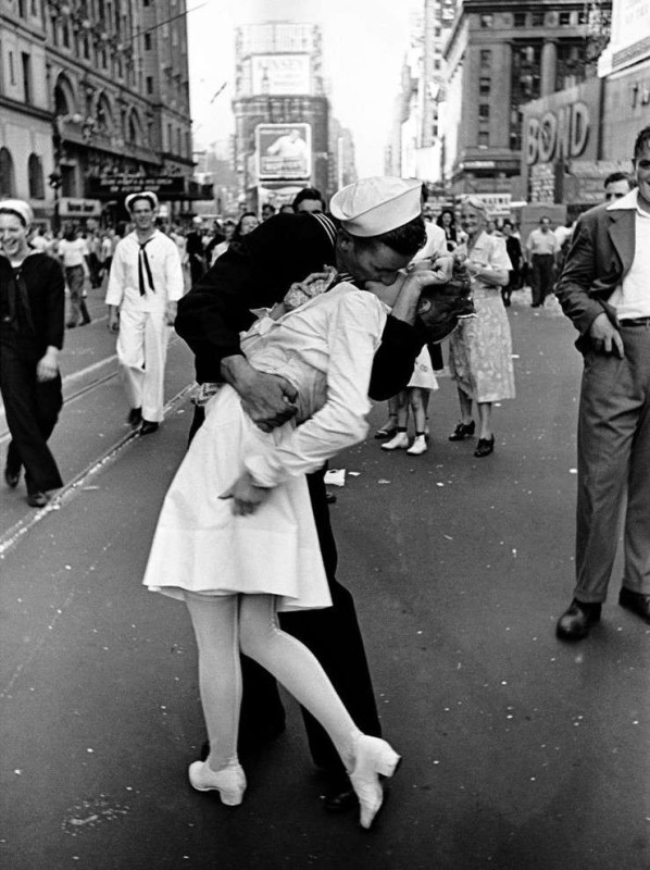 THE OFFENSIVE PHOTO of a uniformed warmongering White cis-gendered male violently tongue-raping a non-consenting person of non-color after the U.S. nuked the mostly peaceful Japanese into submission and surrender in August, 1945.