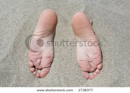 stock-photo-child-buried-in-sand-with-feet-sticking-out-1738377.jpg