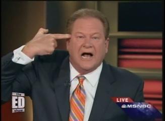 Ed Schultz finger to head.jpg