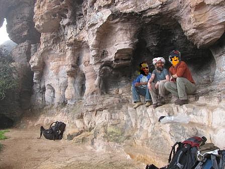 comrades sitting outside cave.jpg