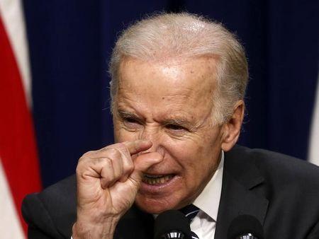Biden pulling bugger from nose.jpg