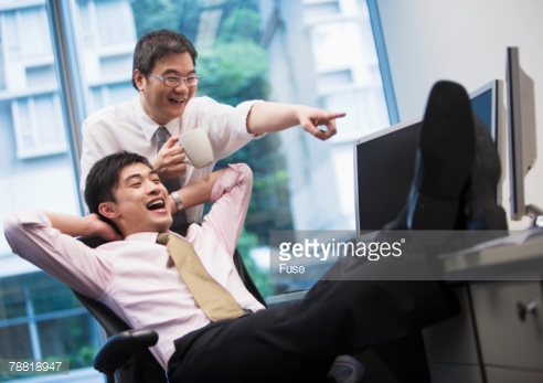 GettyImagesLaughingAsianBusinessmen.jpg