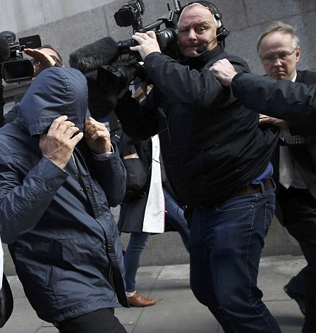 Sting hiding his face.jpg