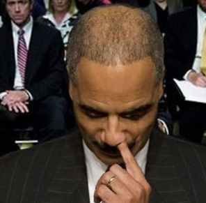 Eric-Holder-picks-nose.jpg