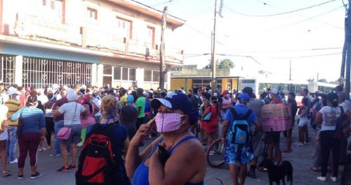 Habaneros waiting for barely edible food.jpg