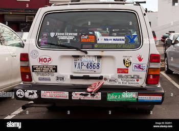 bumper-stickers-on-back-of-vintage-volvo-station-wagon-virginia-usa-EG3RY1.jpg