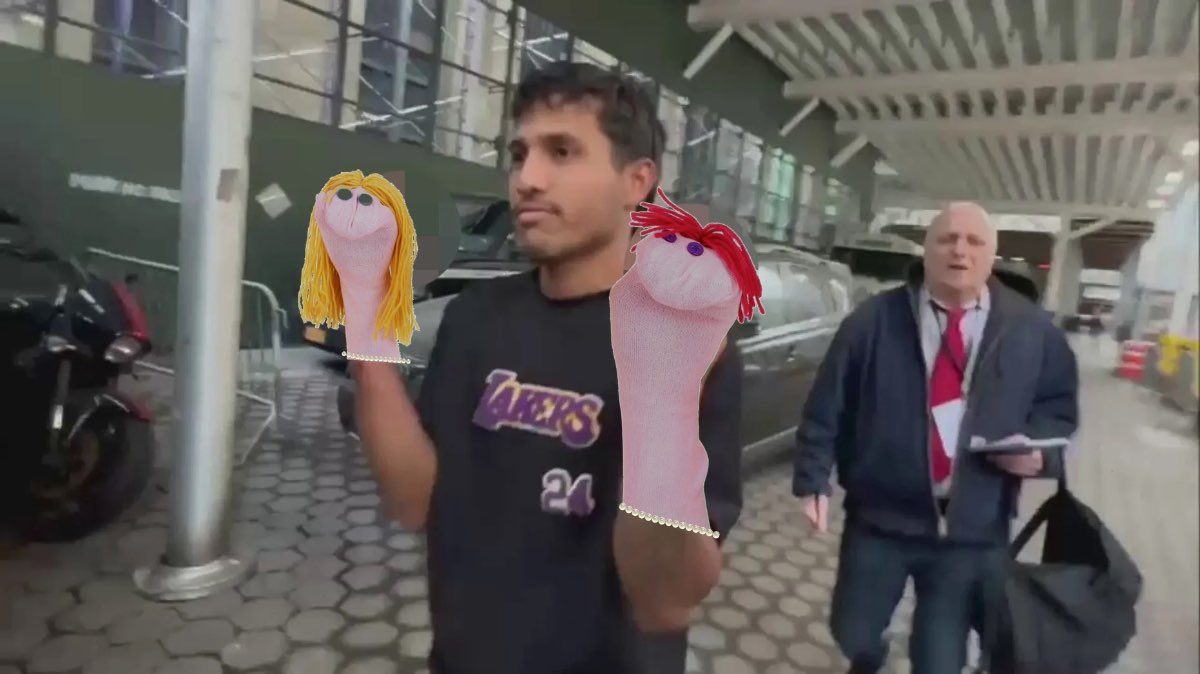 Blurred_Illegal-migrant-flips-the-bird-after-arrest-for-attacking-NYPD-officers-Blurred.jpg copy.jpg