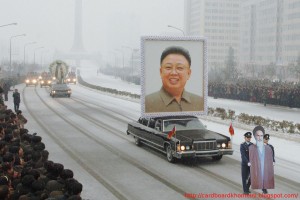 1-Cardboard-Khomeini-Kim-Jong-Ils-funeral-300x200.jpg
