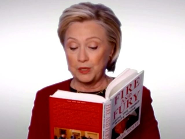 Hillary reading from Fire and Fury.jpg